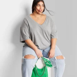 Women's Short Sleeve Relaxed Fit V-Neck T-Shirt - Wild Fable™ -Trendy Wear Women Store GUEST de2f8a46 b446 4432 bdf2 c15fe5d5e799